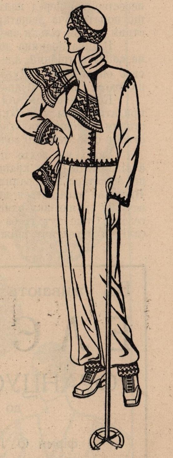 Брунатний лещатарський стрій, прикрашений коліровою обміткою. Пестрий шалик і рукавиці