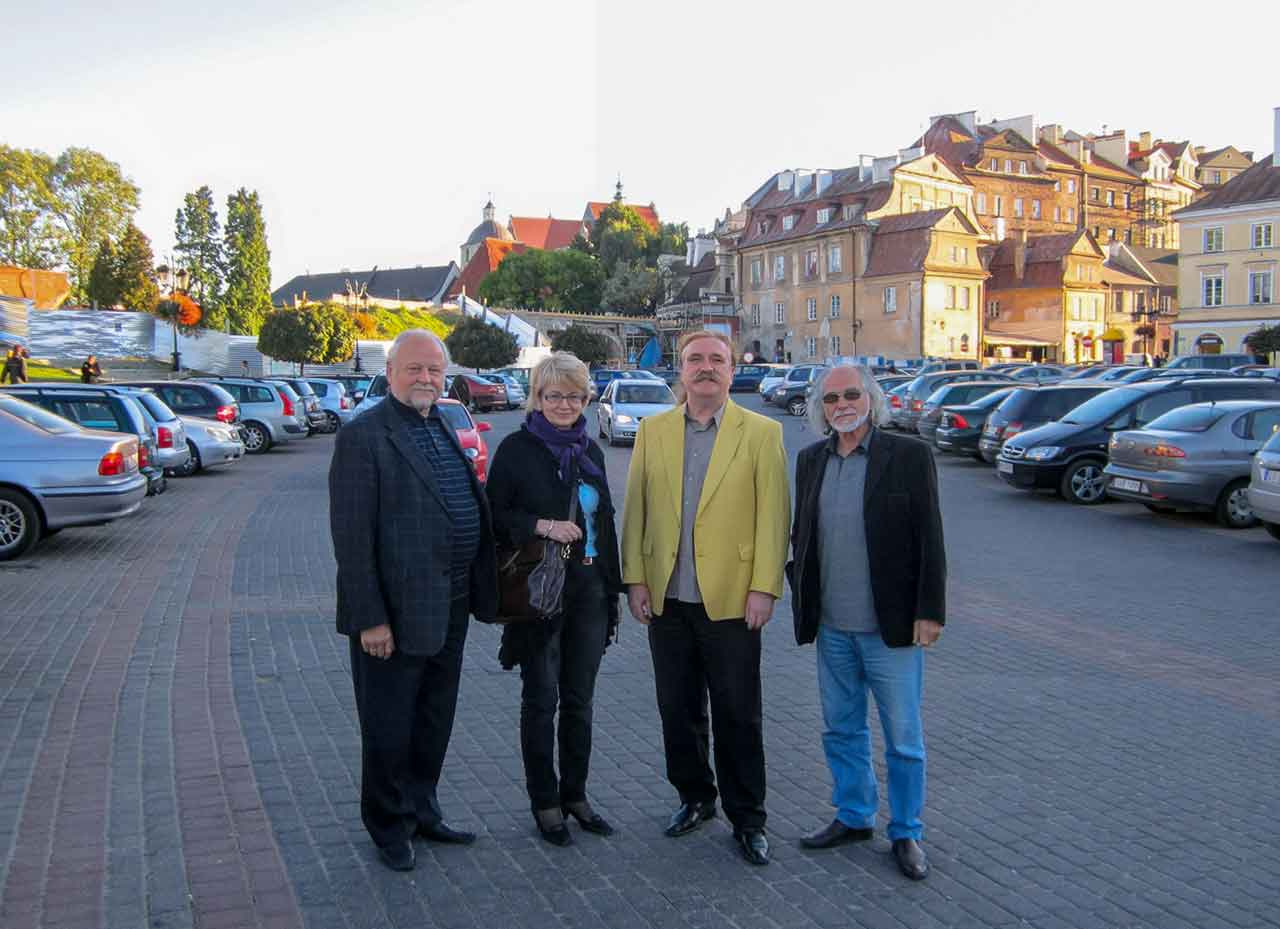 О. Коровицький (крайній праворуч) з ректором ЛНАМ А. Бокотеєм, професором З. Тканко та професором Збігнєвом Пакулою. Люблін (Польща), 2012